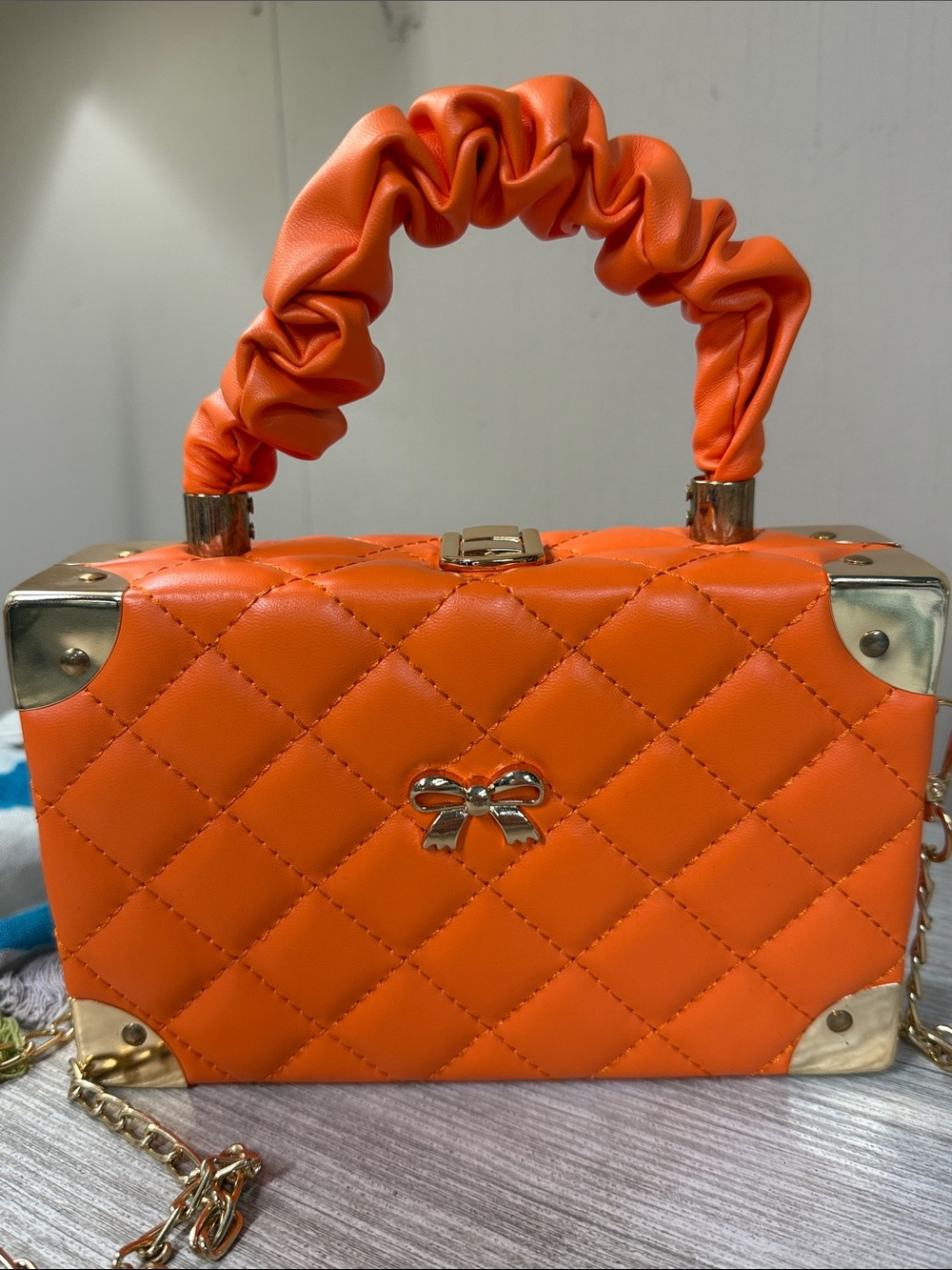 Orange Quilted Top Handle Hard Shell Box Bag with Gold Accents